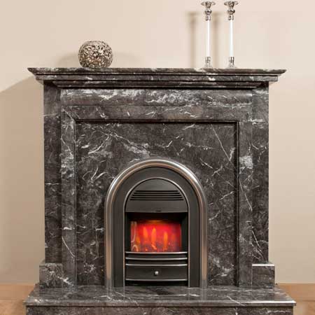 A superbly crafted chimney piece of classical heritage, re-invented for today’s traditional and modern interiors.

Features moulded frame mantel opening and oval frieze. Shown in Grigio Carnico Natural Marble.

Fire for illustration purposes only.

